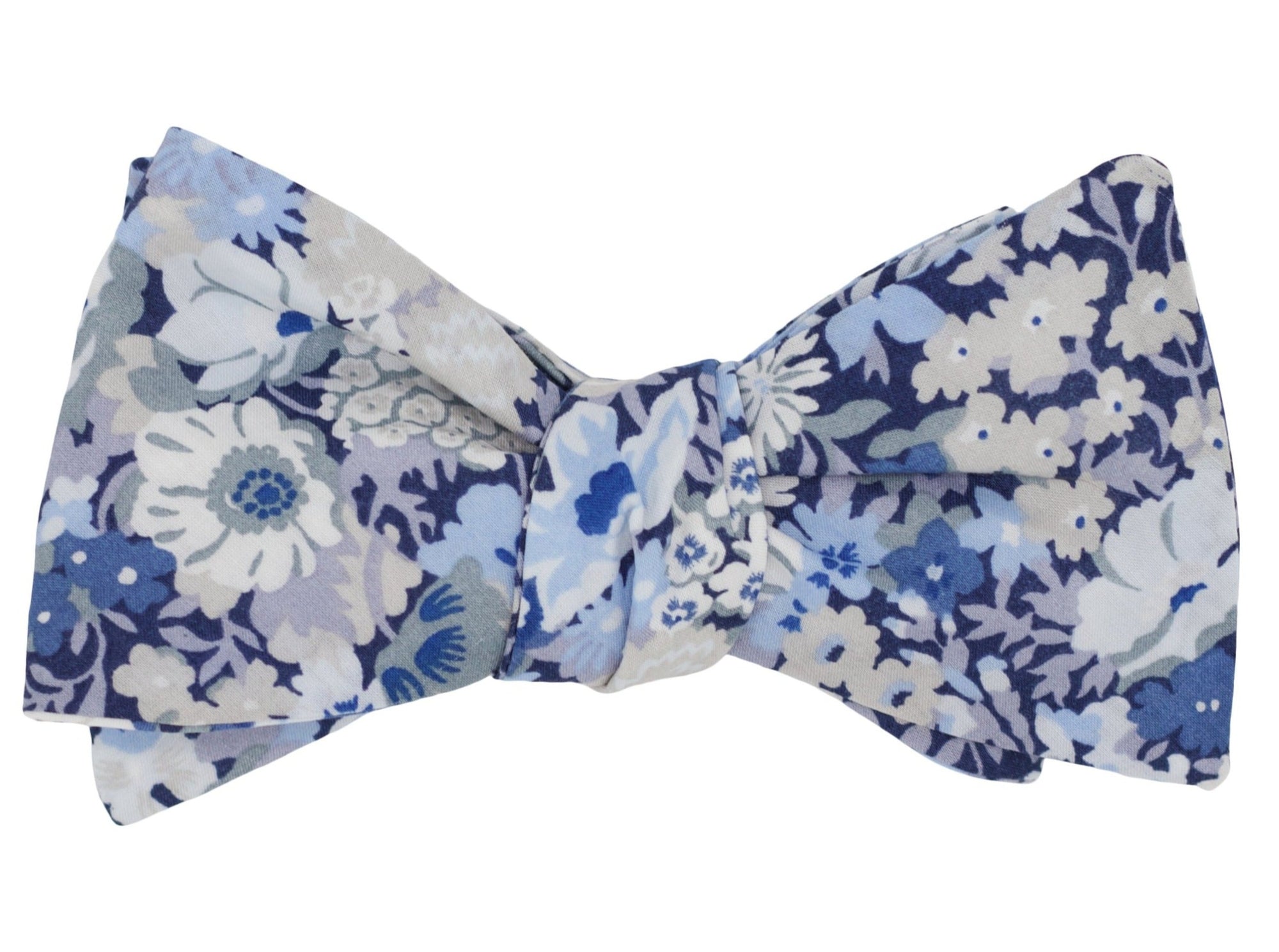 Mens cotton self tie bow tie featuring a blue floral pattern. 