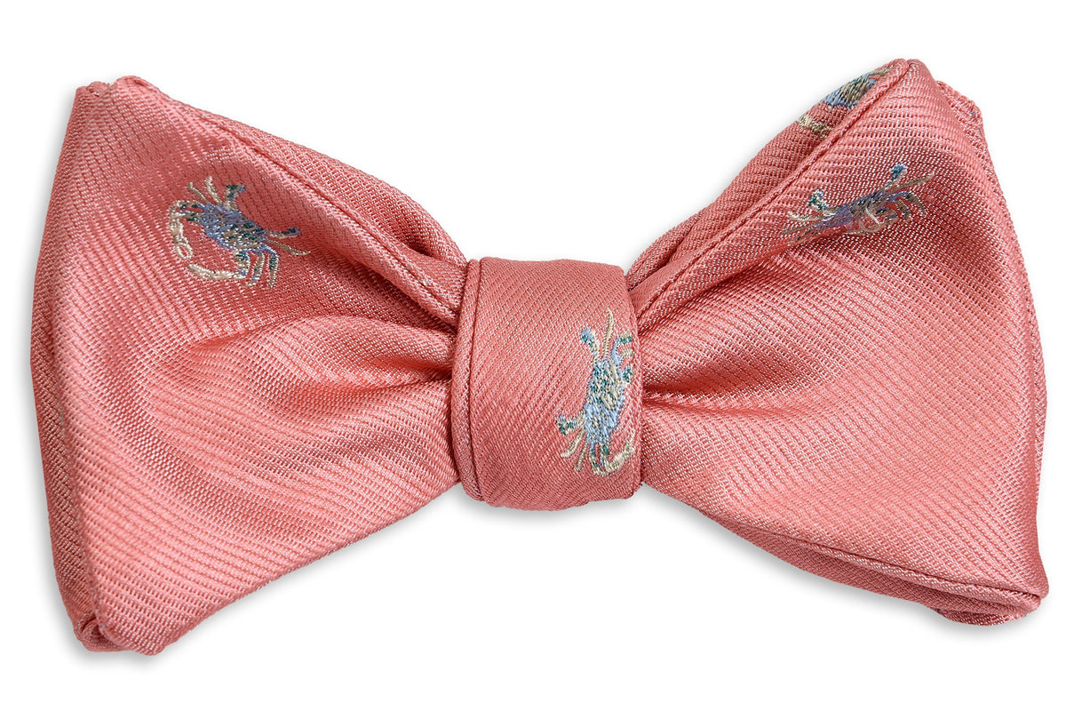 Coral men&#39;s bow tie made from silk.