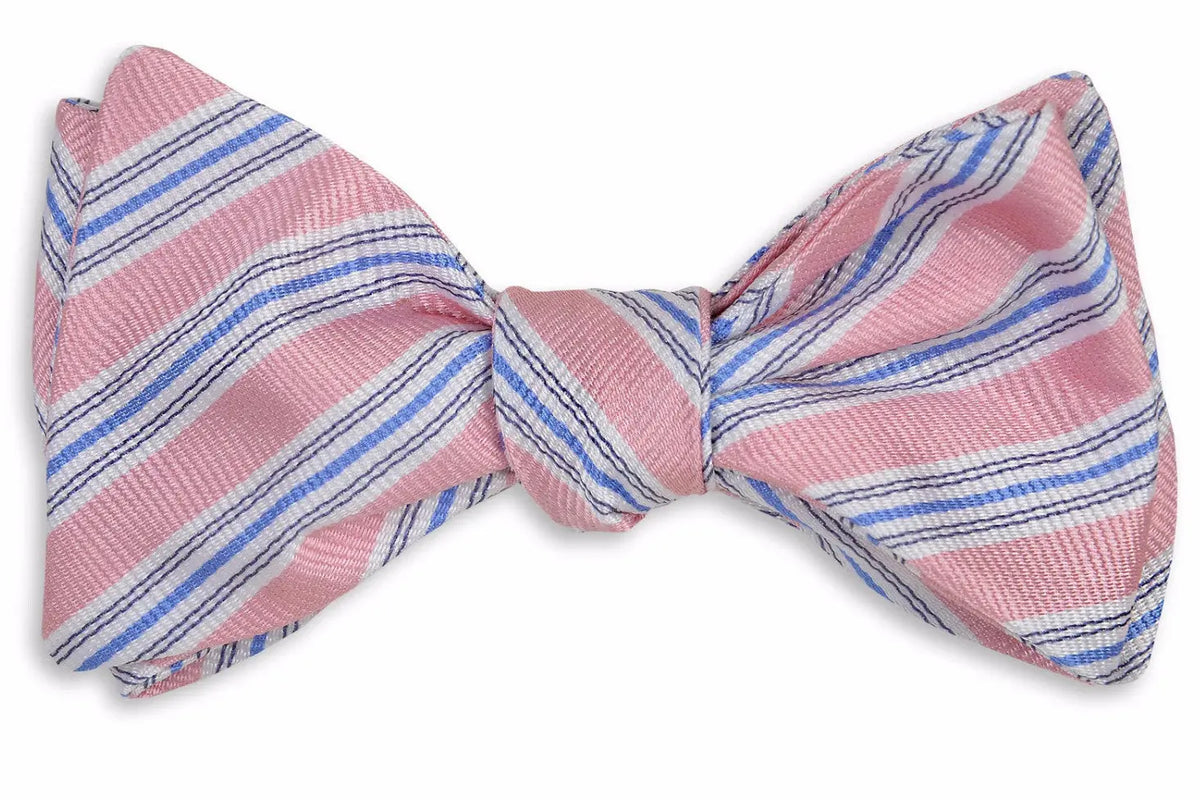 Men's pink bow tie. 100% silk with a blue and white striped design.