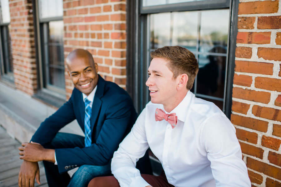 navy suit pink bow tie