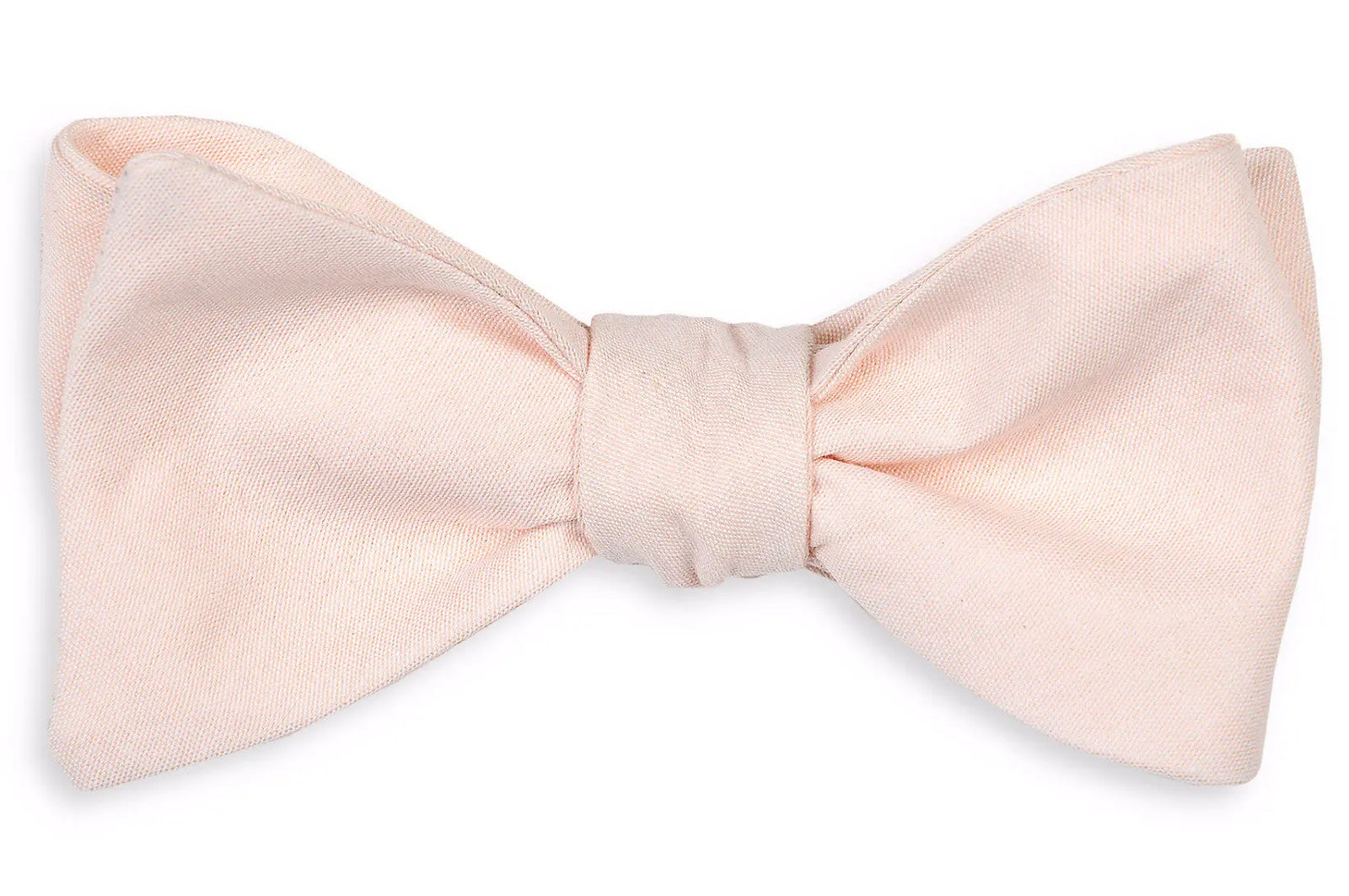 Men's peach colored bow tie. Made from 100% cotton.