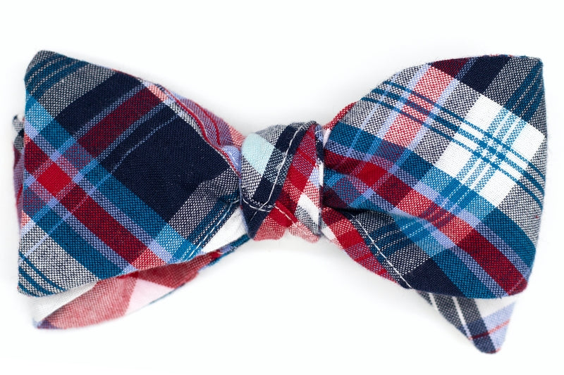 plaid mens bow tie, featuring a red, white, and blue design.