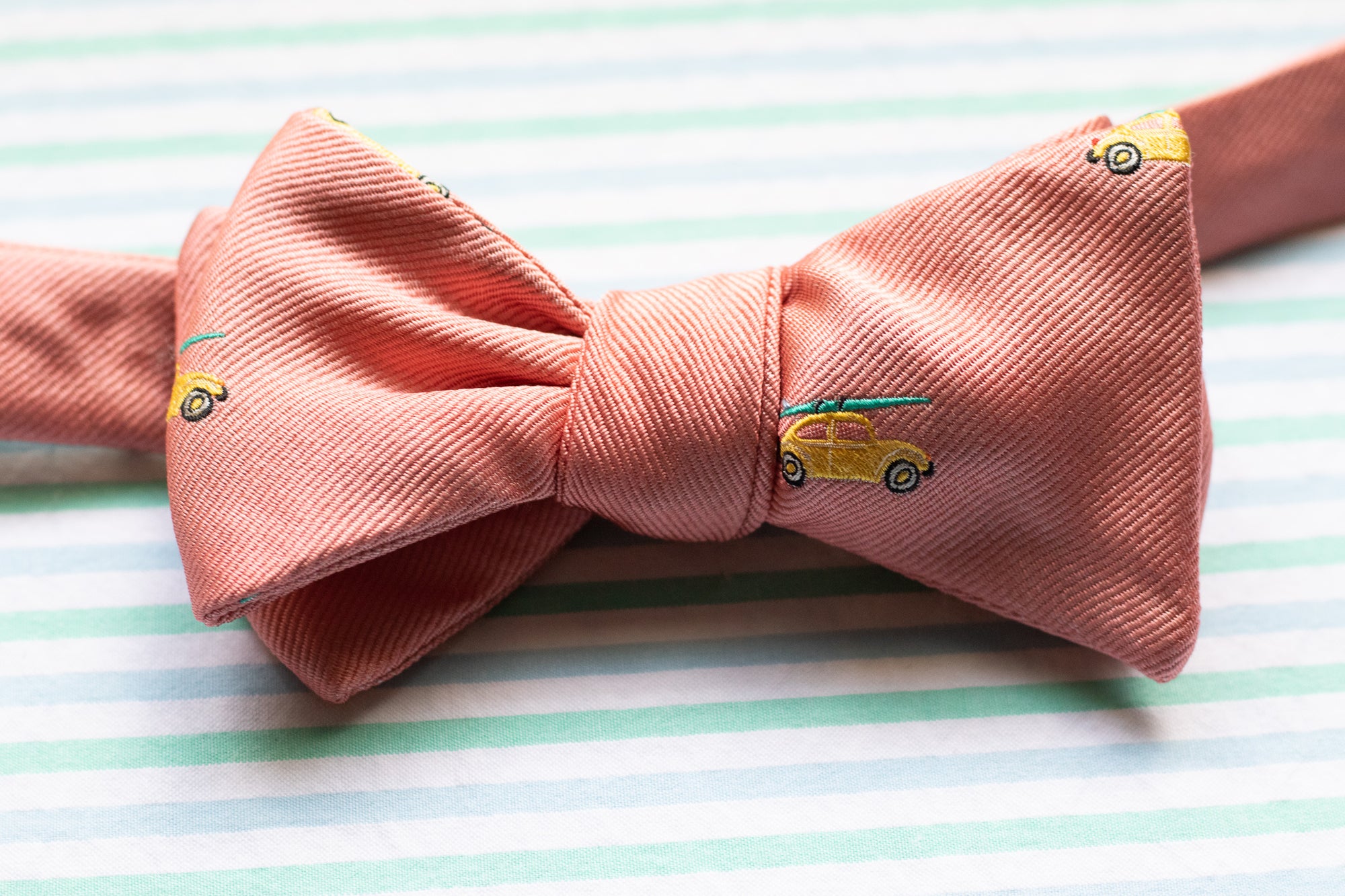 Men's coral bow tie. Made from 100% Italian silk.