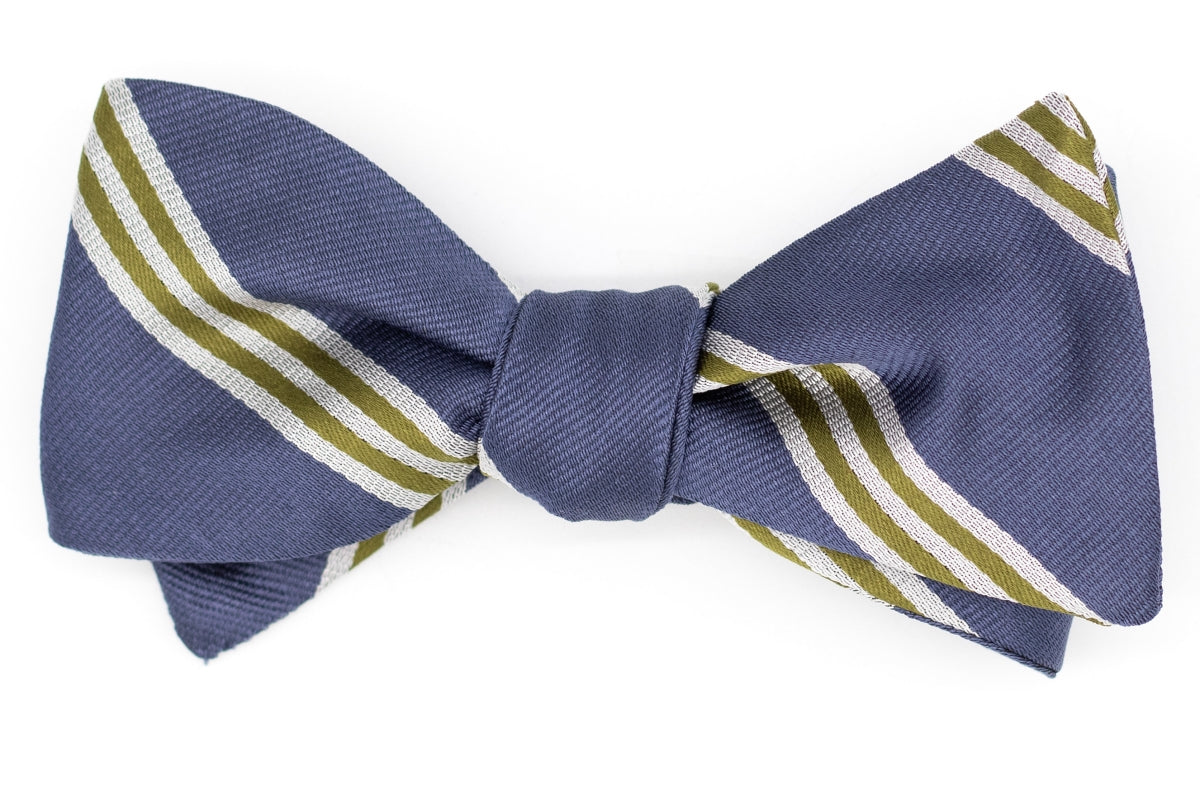 mens bow tie is made of 100% silk. The navy base color is complimented by white and green stripes.