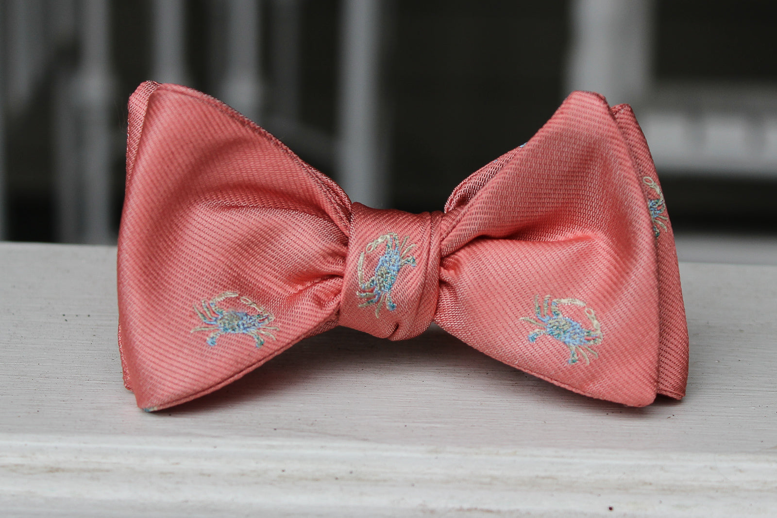 Coral men's bow tie made from silk.
