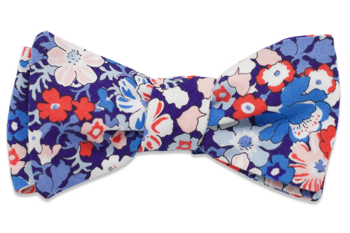 Cotton mens bow tie with a blue floral pattern.