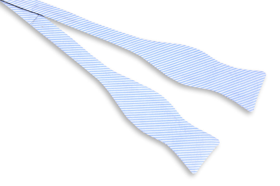 Mens light blue seersucker bow tie. Made from cotton.