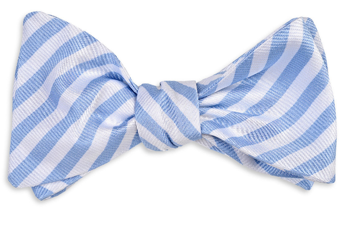 Carolina blue, silk, mens bow tie featuring a white stripe pattern.