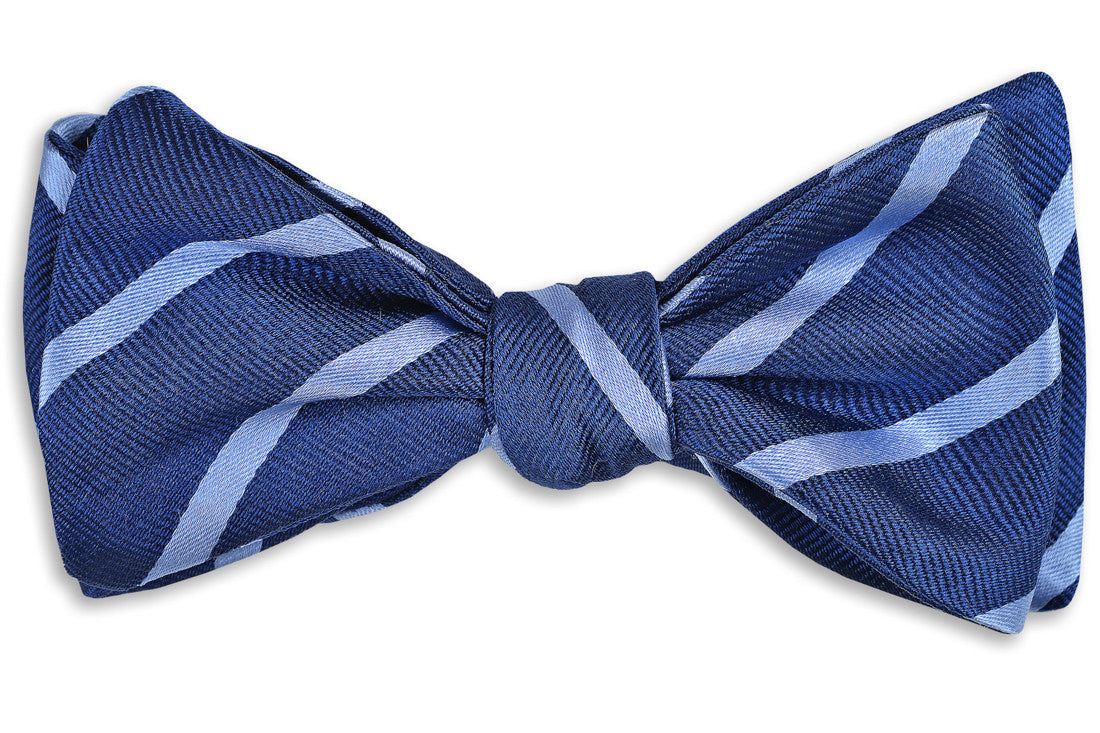 blue mens bow tie with a light blue striped pattern. Made from 100% silk.